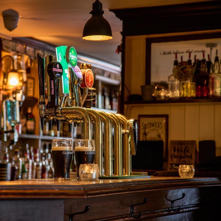 Castlemartyr Resort Hotel ภายนอก รูปภาพ Beer taps in a pub